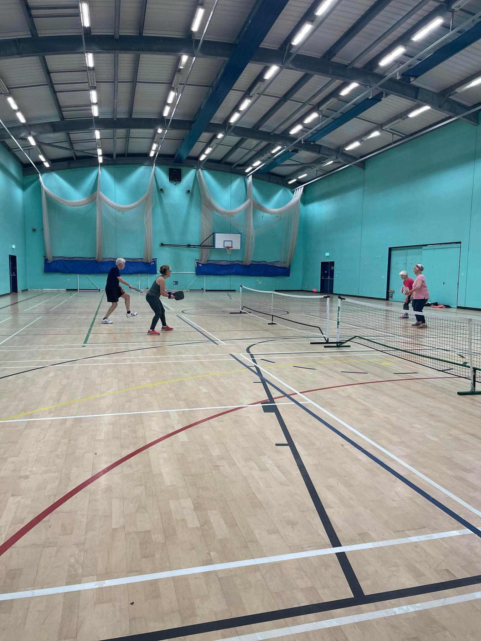 Members playing on the wood courts at GO! St Just.